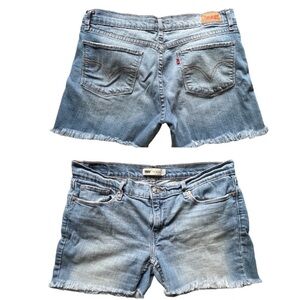 Levi’s Blue distressed raw hem cut-off blue jean shorts, broke in